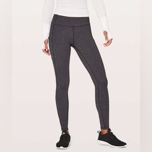 Lululemon Speed Up Tight Heathered Black Size 6 with rip tag and size dot